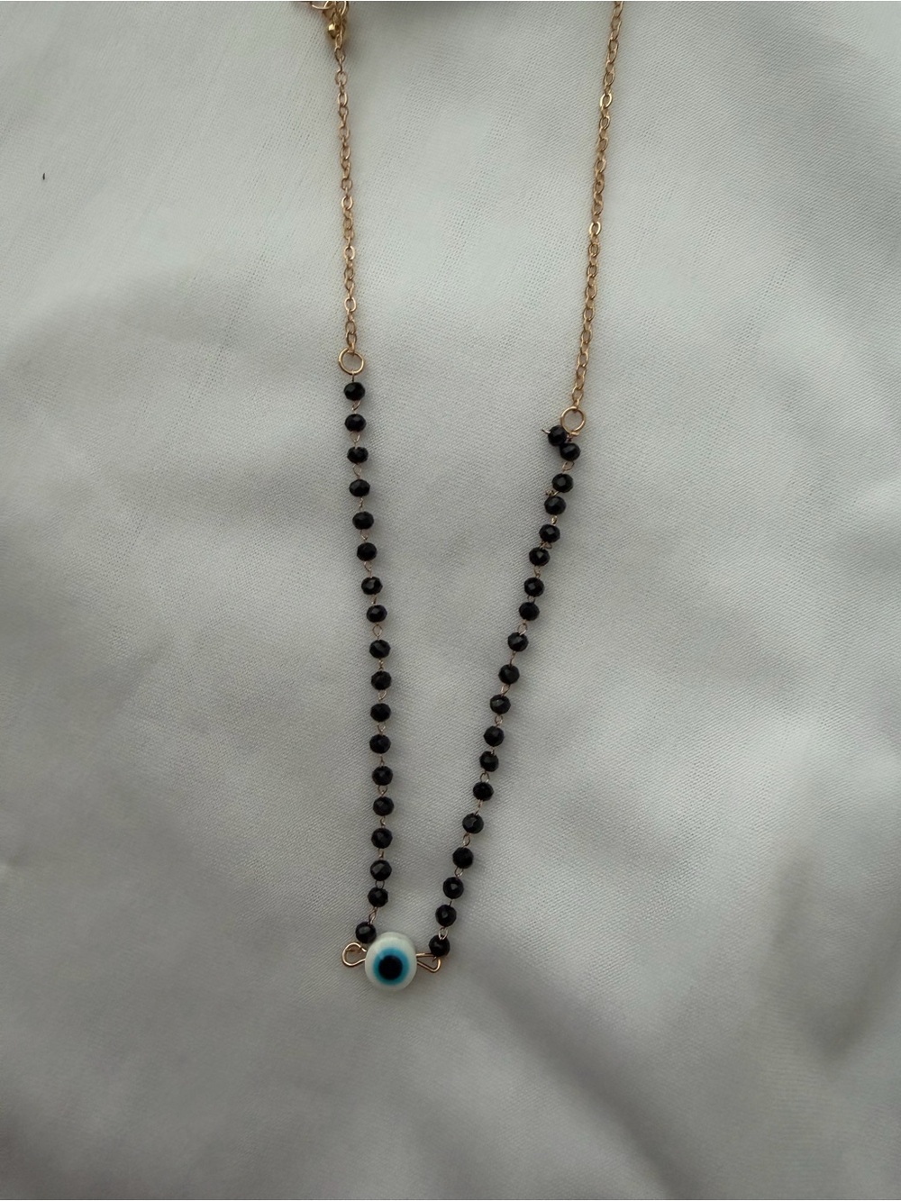 Gold Chain Black Bead Necklace with Blue Evil Eye Pendant